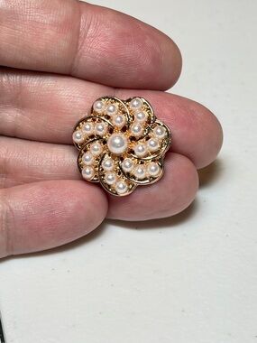 Elegant Gold and Pearl Swirl Brooch.